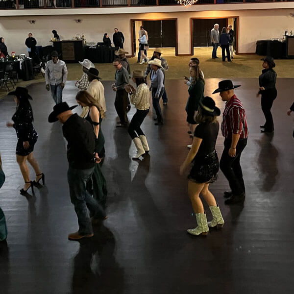 line dance instruction at a wedding event