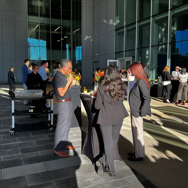 group of people in business attire at a corporate event planned by Total Events DFW